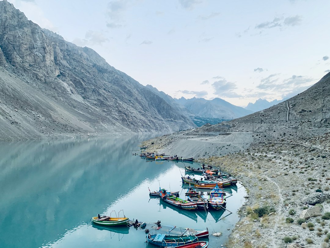Boats on a mountain lake in the Skardu region of Pakistan