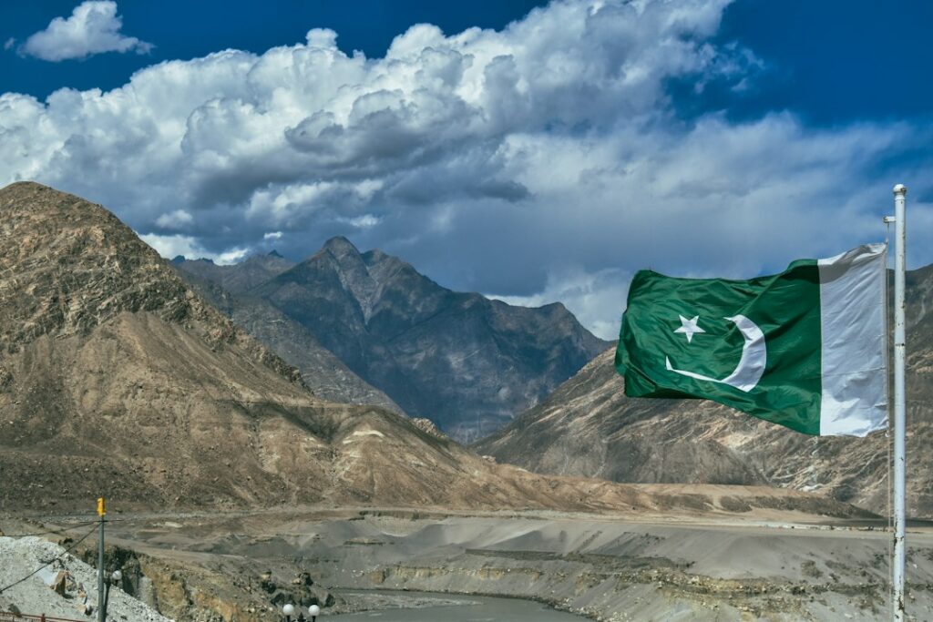 Pakistan flag above the mountains near Skardu and Shigar