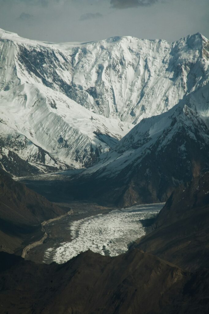 Winding glacier through a high Karakoram valley in Pakistan